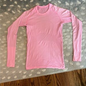 Blush pink Swiftly Tech Long-Sleeve Shirt 2.0 Hip Length. Size 6